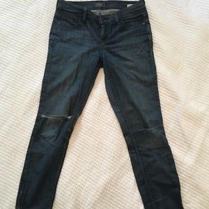 Guess brand dark distressed denim lowish rise.